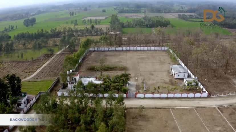 Mini farmhouse property Backwoods 8 near Rajaji National Park by Dharatal Greens Pvt Ltd